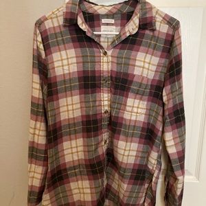 Beige and maroon colored flannel